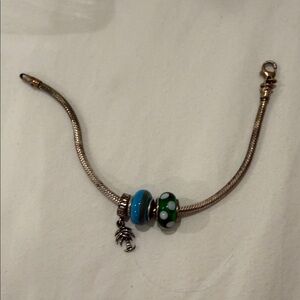 Elegant Silver Charm Bracelet with Blue and Green Accents